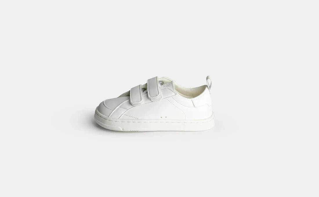 Koops Auro Blanco, sabata respectuosa infantil blanca amb doble velcro i sola flexible zero drop.