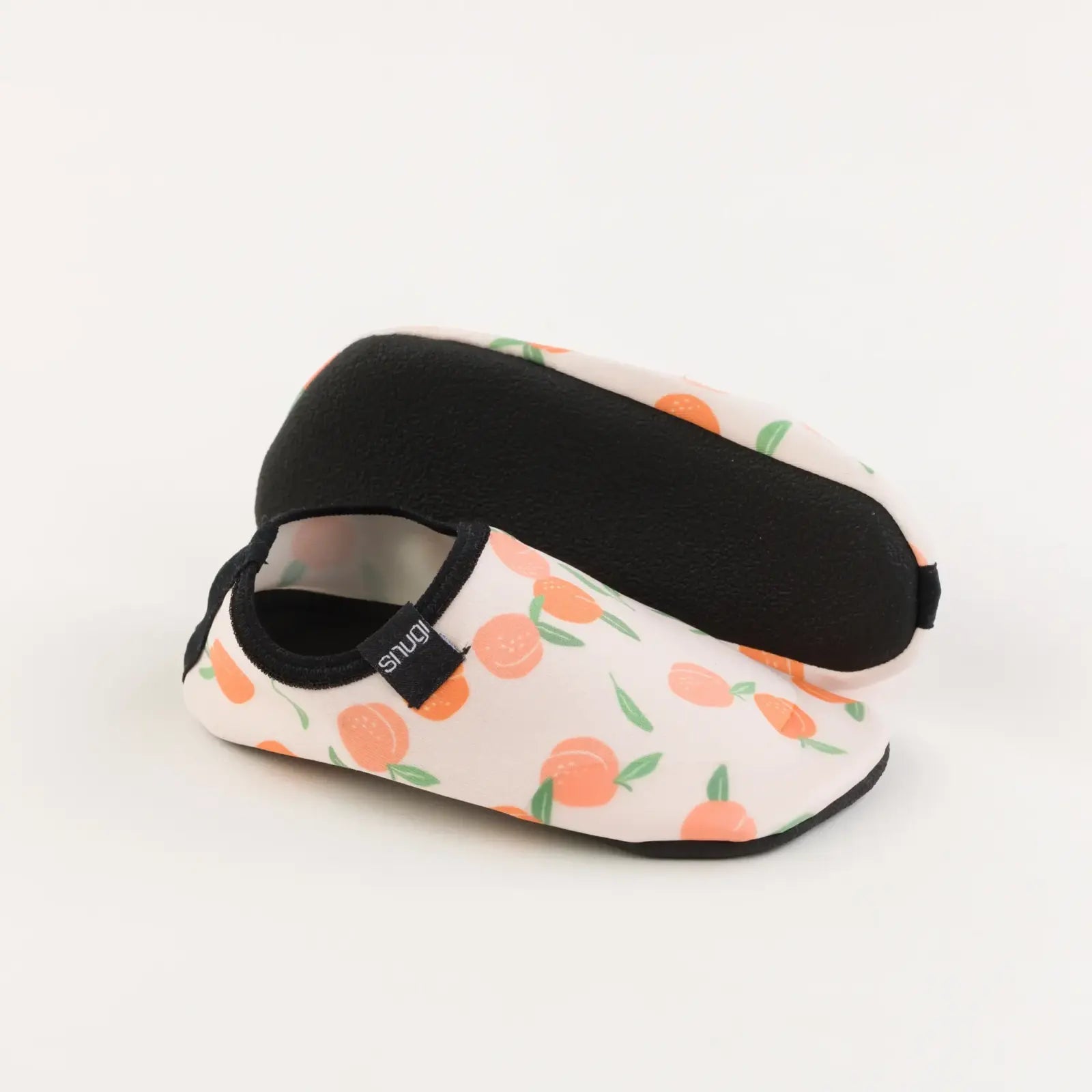 Snugi Kids Aigua, sabatilla aquàtica barefoot infantil amb estampat marí i sola antilliscant flexible.