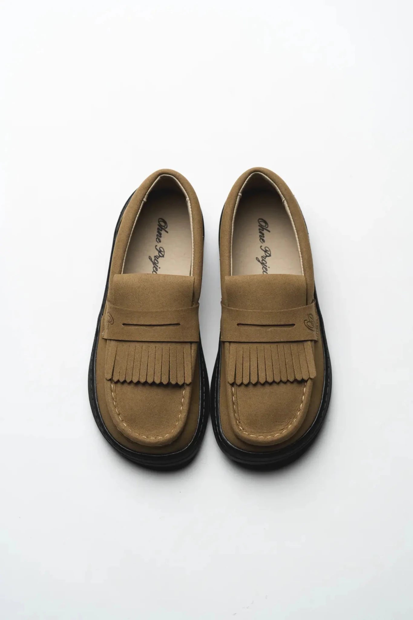 Mocassí barefoot Ohne Project Luma Amberwood marró amb serrells desmuntables i sola negra flexible.