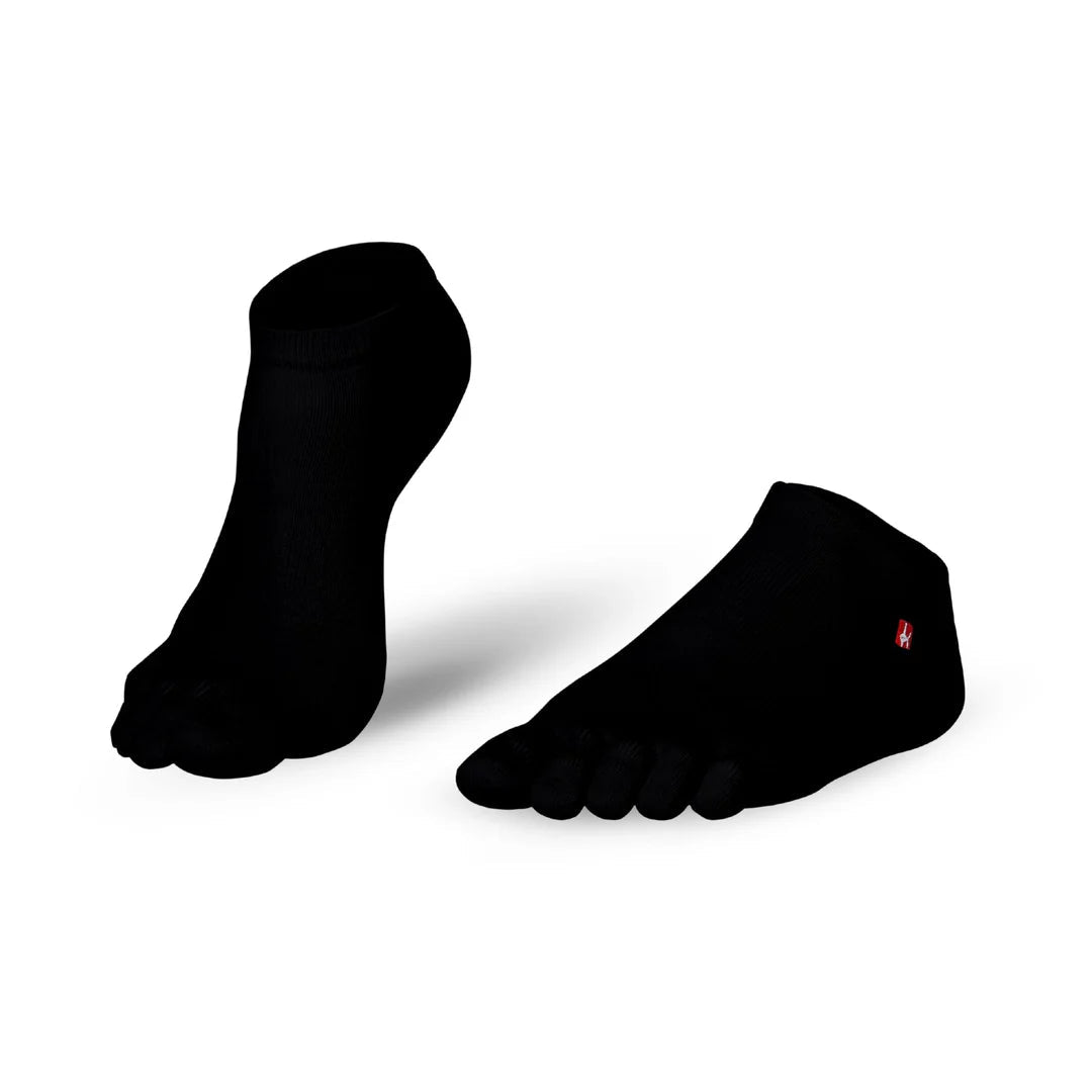 Mitjons Knitido Track & Trail negres amb dits separats i teixit transpirable per a running i ciclisme.