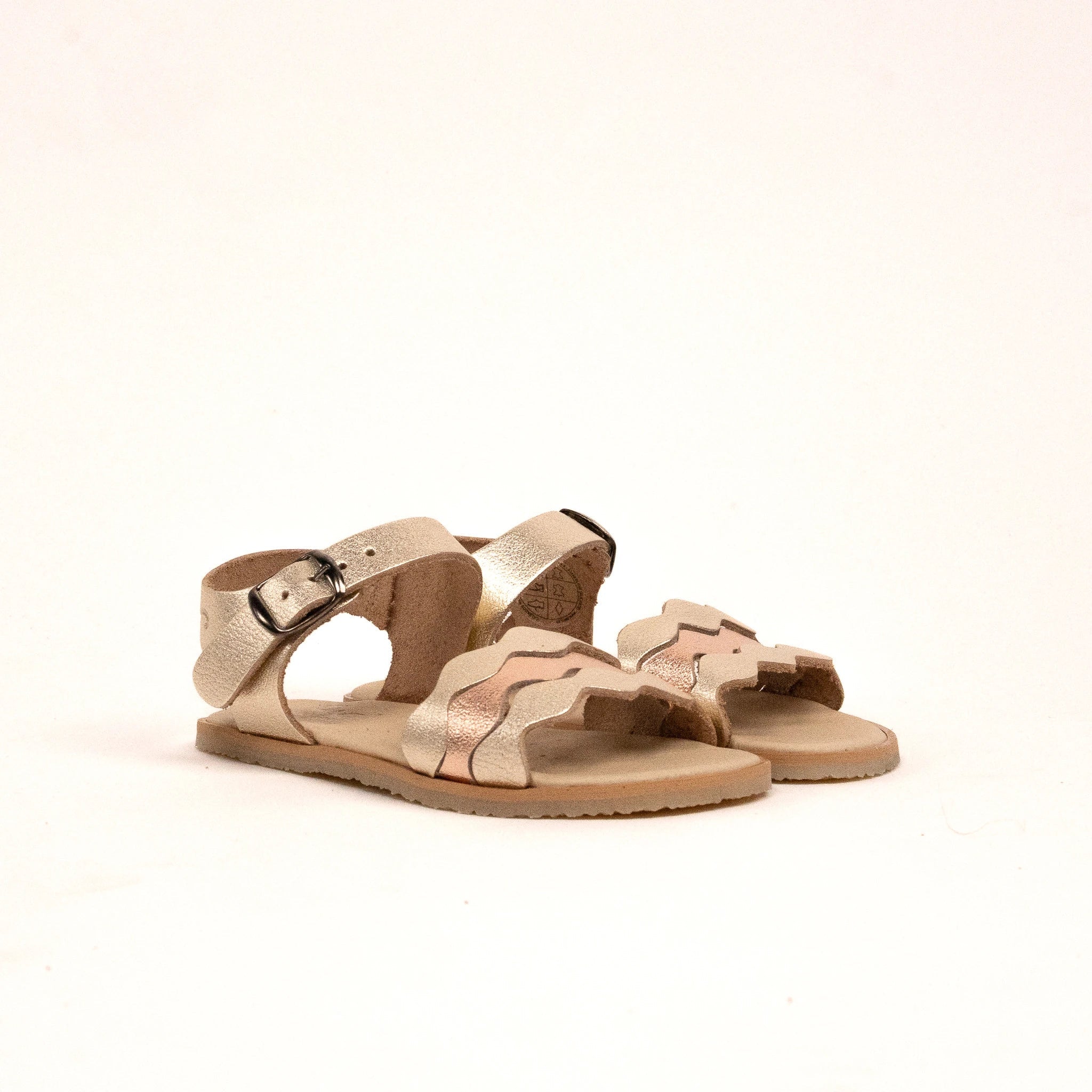 Flexinens Caprone 5135-PR, sandàlia respectuosa infantil rosa daurat amb sola flexible i tancament ajustable.
