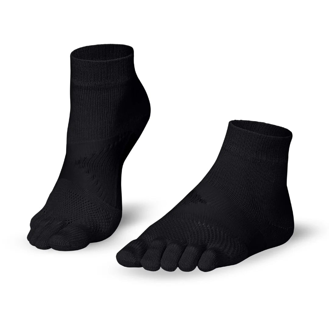 Mitjons Knitido Marathon negres amb dits separats, dissenyats per a running i llarga distància.