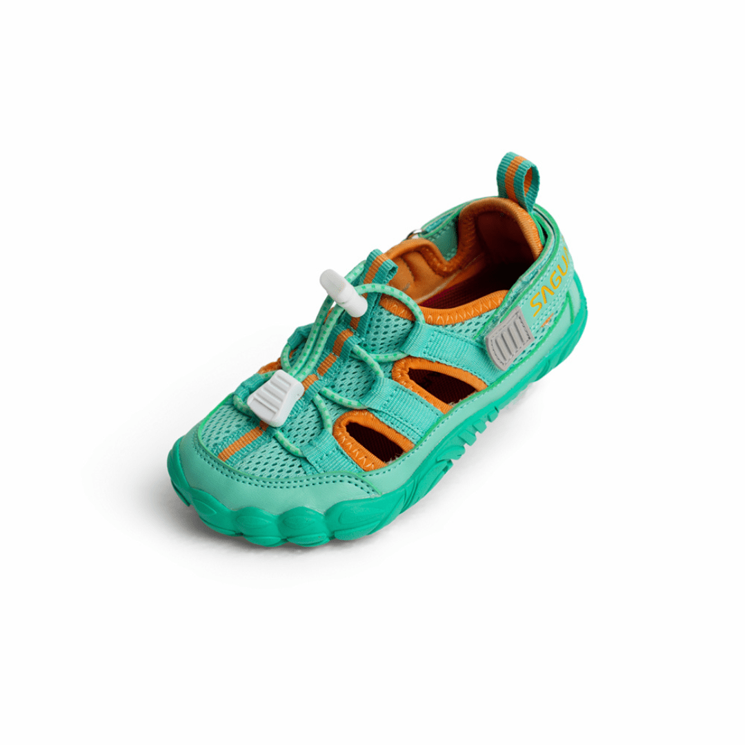 Saguaro Kids Breeze III Cyan, sandàlia barefoot infantil transpirable amb ajust ràpid i sola flexible en color turquesa.